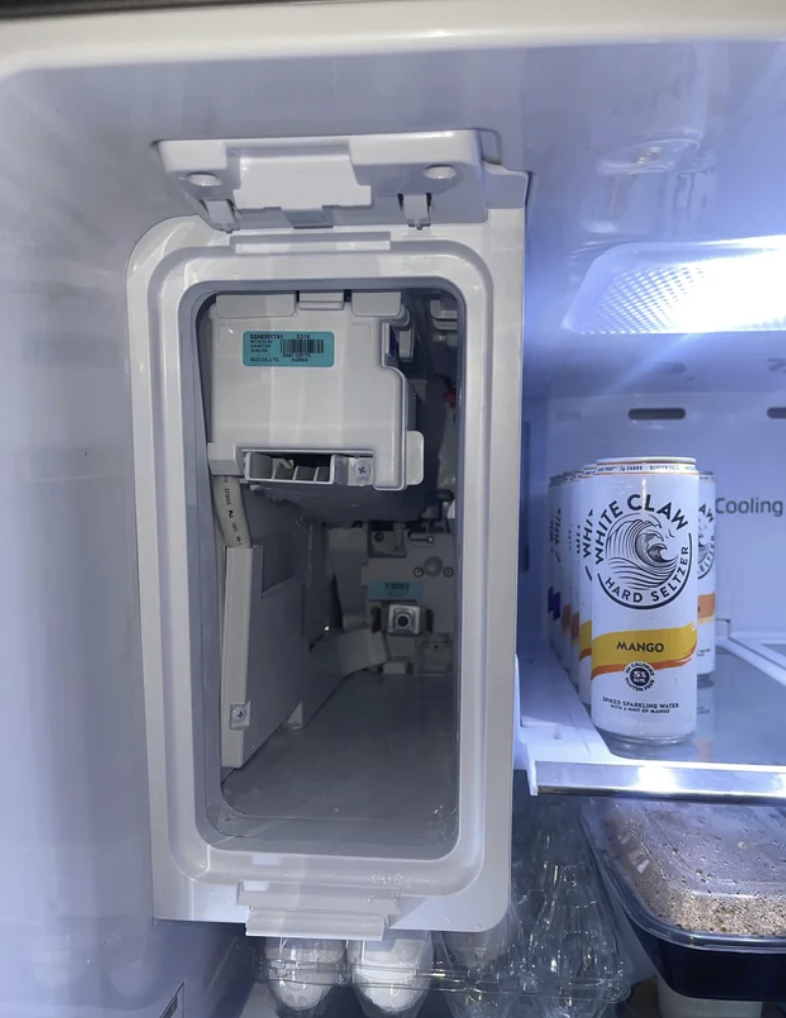 Refrigerator ice maker compartment opened during a defrost and frost service on Long Island
