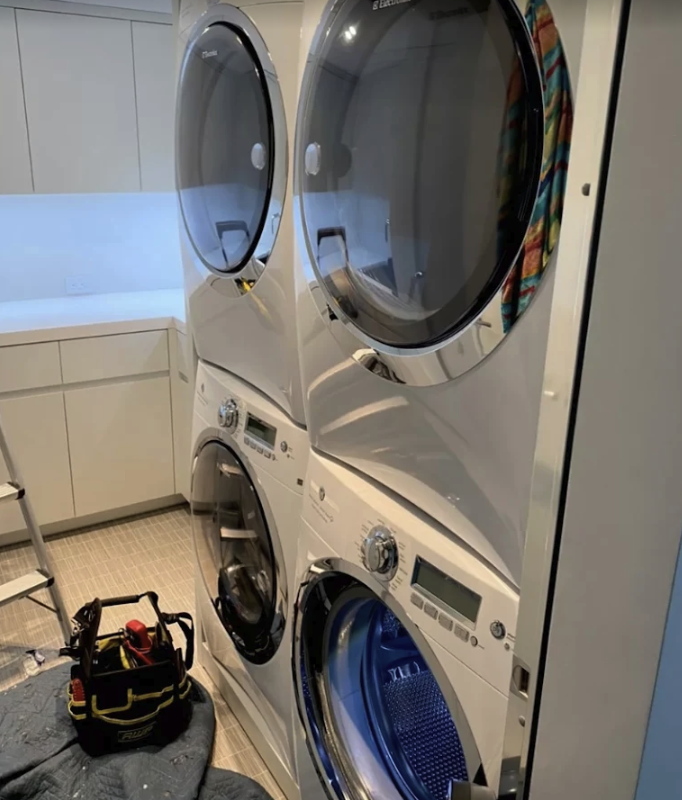 Stacked Electrolux washer and dryer service